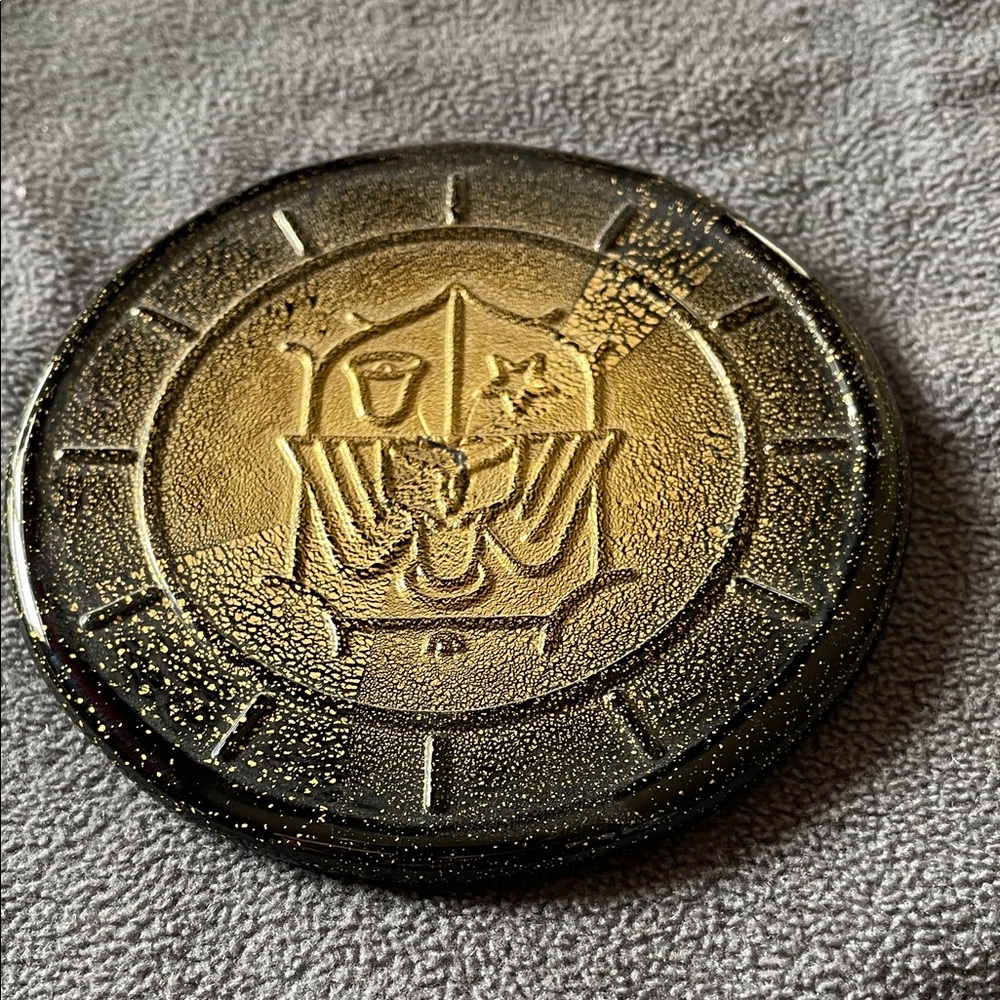 Gold and Black Decorative Coin